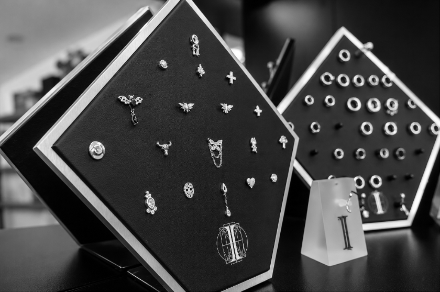 Threadless piercing jewelry display boards at Queen of Hearts Nashville
